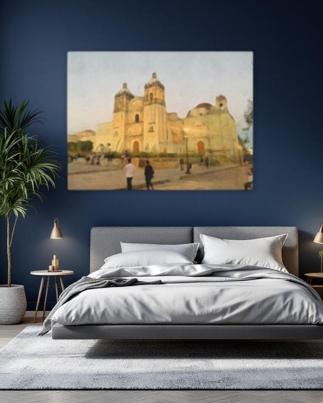 Museum-grade canvas print of the Catedral de la Asunción watercolor, styled in a modern bedroom interior with navy blue walls and neutral bedding.