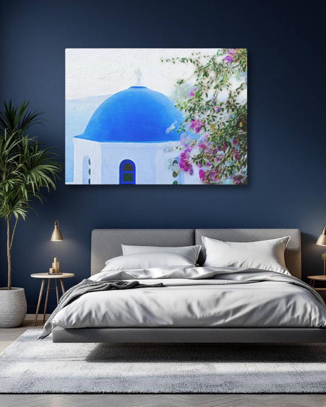 Museum-grade archival canvas print of Santorini's iconic blue-domed church and bougainvillea watercolor, styled above a minimalist gray bed in a modern room with deep navy walls.