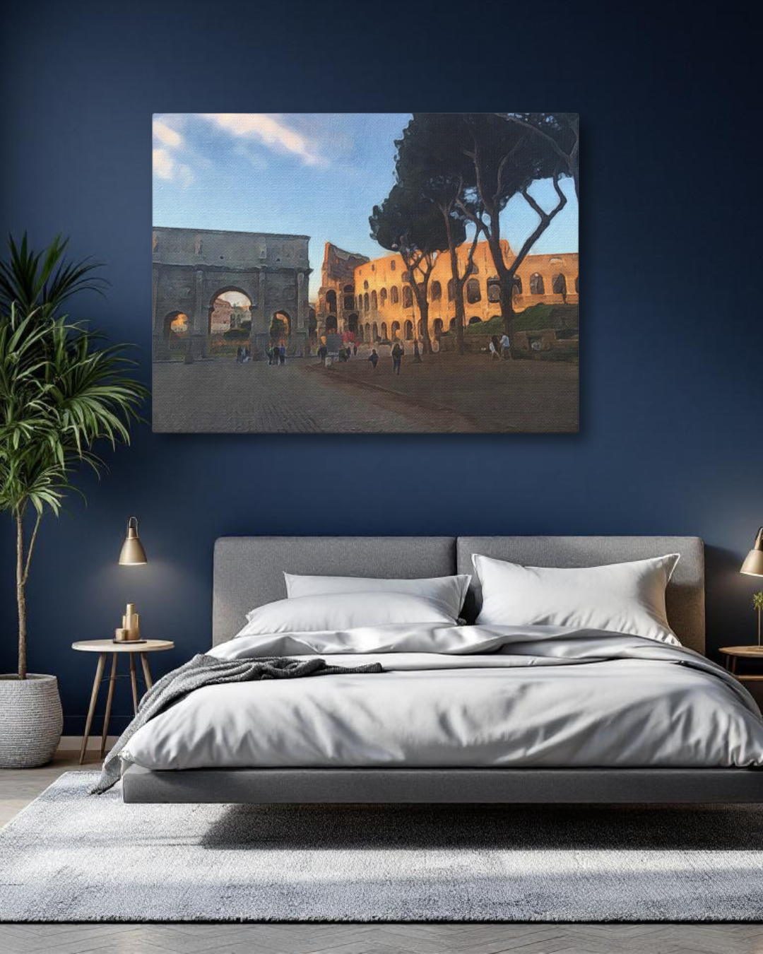 A gallery canvas of Rome’s Colosseum and Arch at sunset, hanging on a navy wall in a modern bedroom with a potted plant and lamp.
